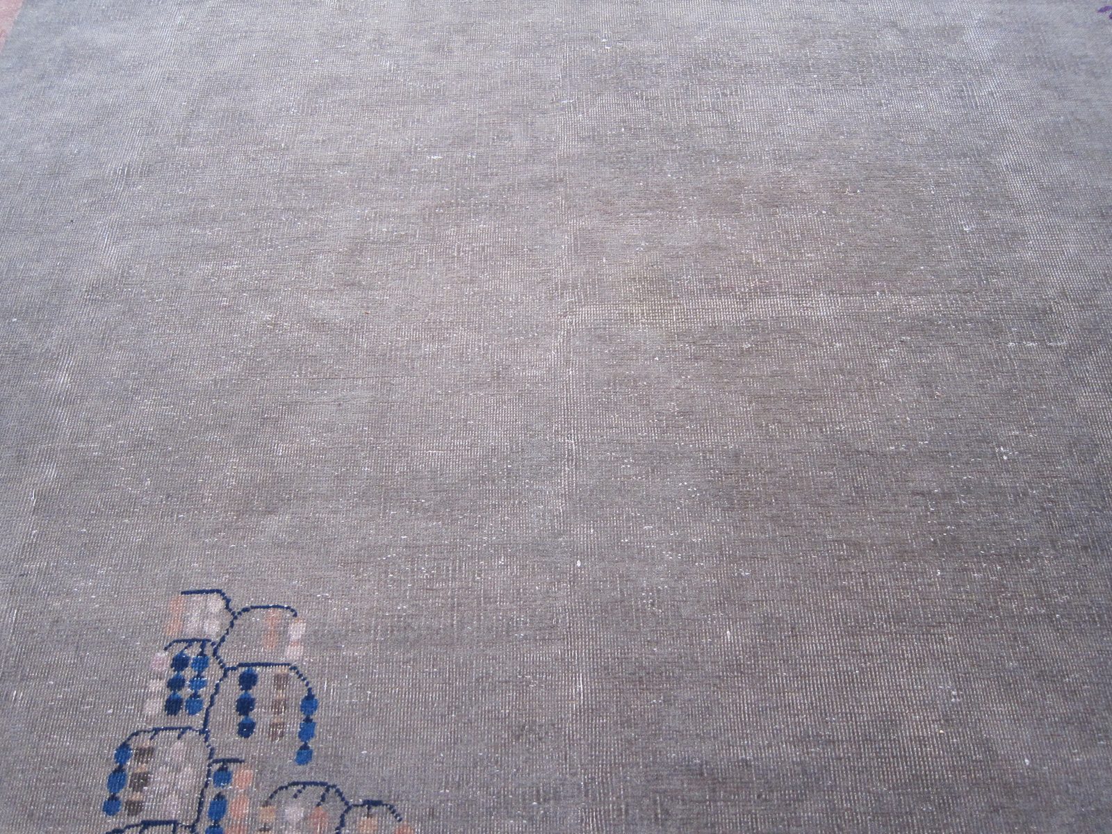 Bottom center of carpet